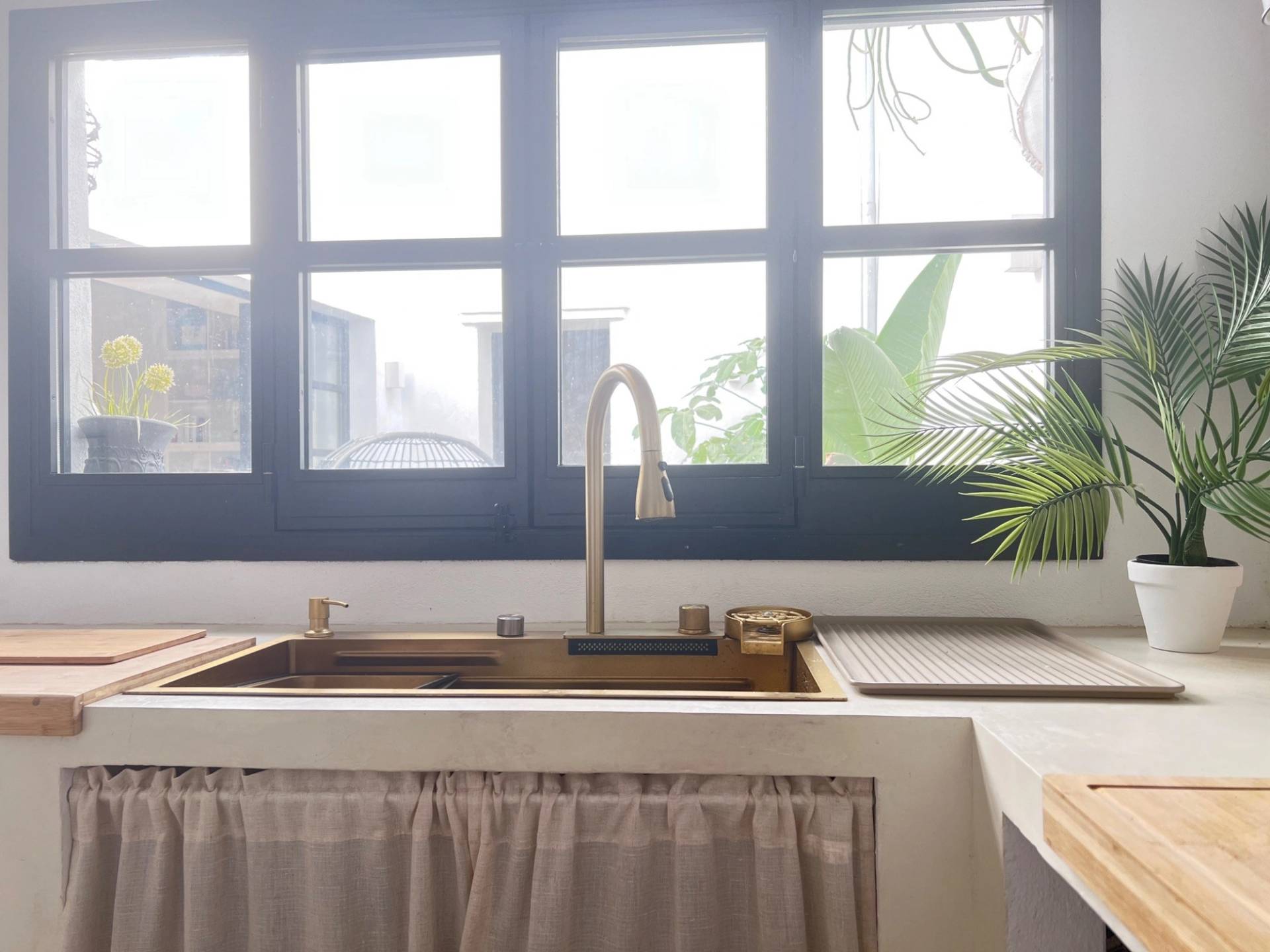 Detail shot of a rustic kitchen sink and traditional window nook in Jimena de la Frontera Cádiz from Love Locations.