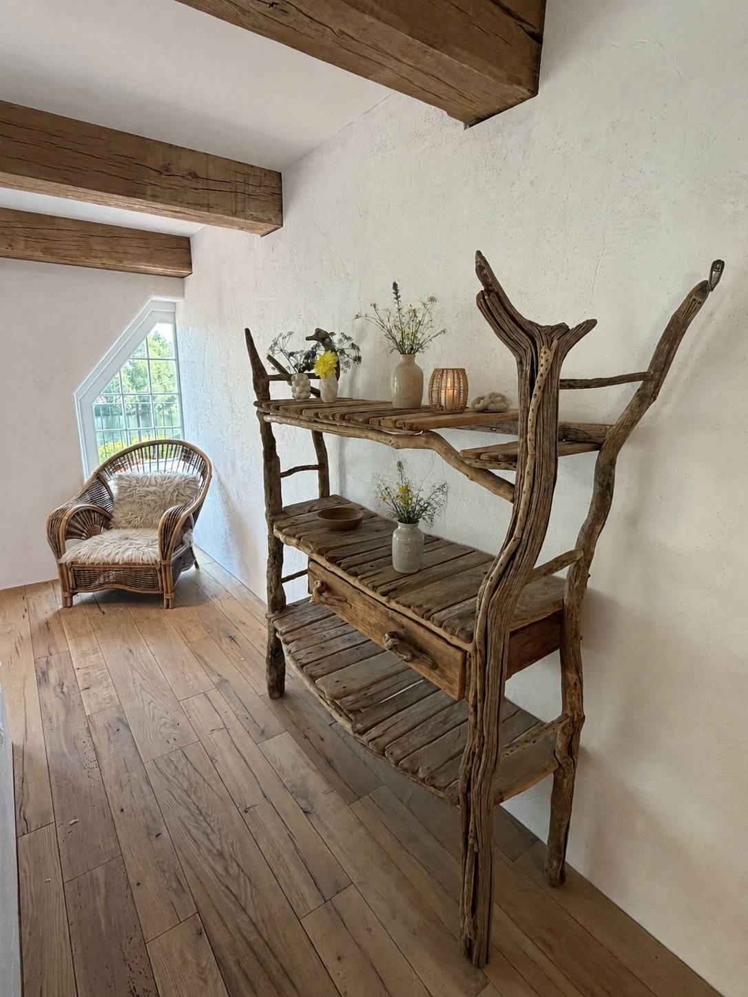 Love Locations country-style bedroom with exposed beams for photography
