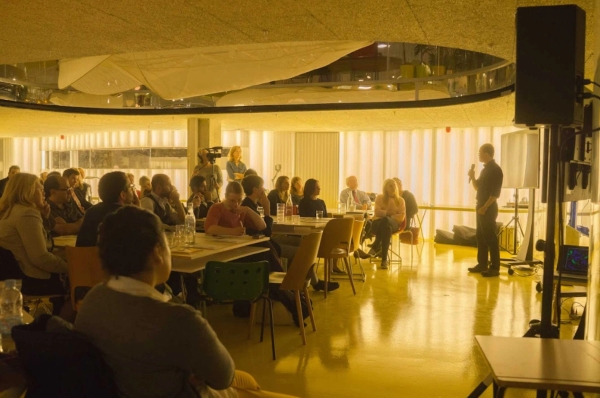 Modern London creative event space with colourful seating and central skylight in Whitechapel E1 – love locations
