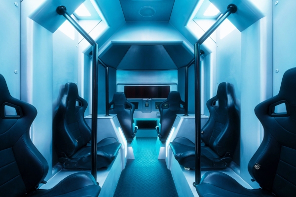 Spaceship crew shuttle interior set featuring rows of pilot seats for immersive cinematic transport scenes, Love Locations.