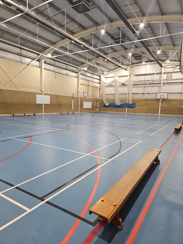 Multi-sports indoor court playground for athletic brand campaigns and youth fitness shoots, bookable through Love Locations.