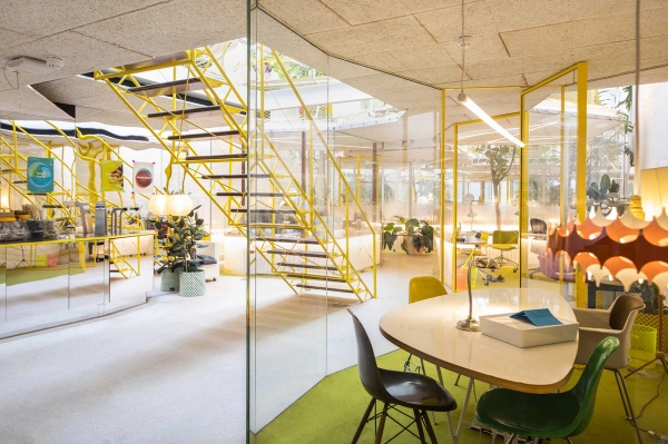 Modern office space with communal desks and glass meeting rooms in Notting Hill London W11 – love locations