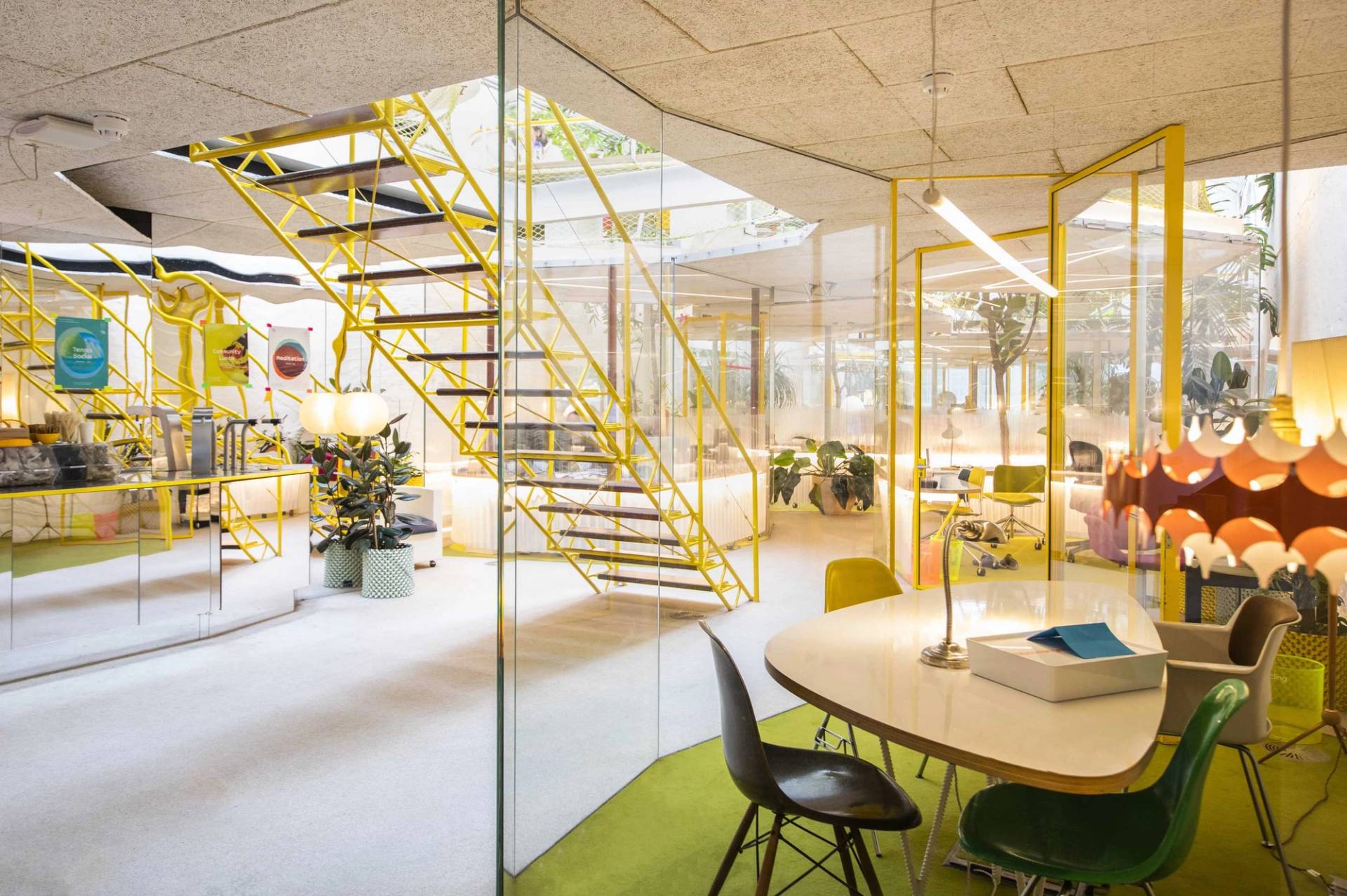Modern office space with communal desks and glass meeting rooms in Notting Hill London W11 – love locations
