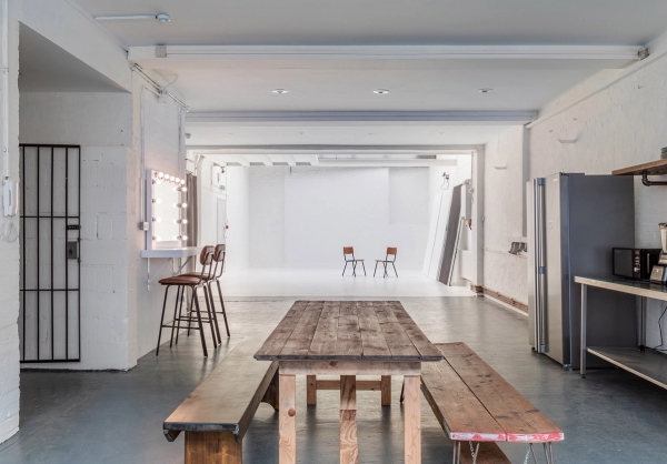 Industrial studio with exposed brick wall backdrop for photoshoots at Brixton Warehouse Love Locations.
