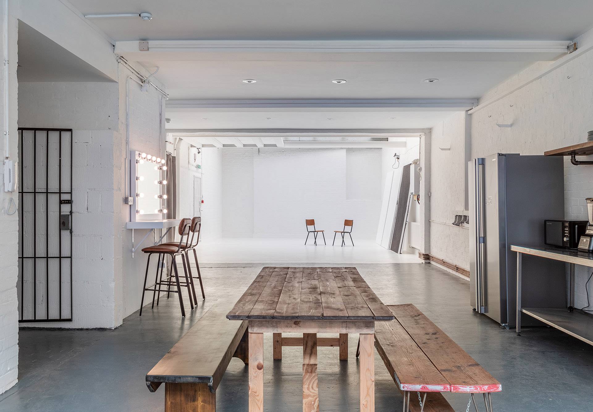 Industrial studio with exposed brick wall backdrop for photoshoots at Brixton Warehouse Love Locations.