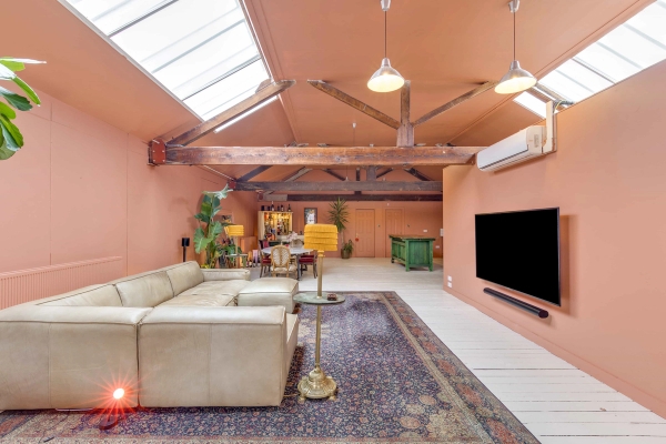 Expansive open-plan creative studio layout with combined lounge, dining, and kitchen zones for filming, Love Locations.