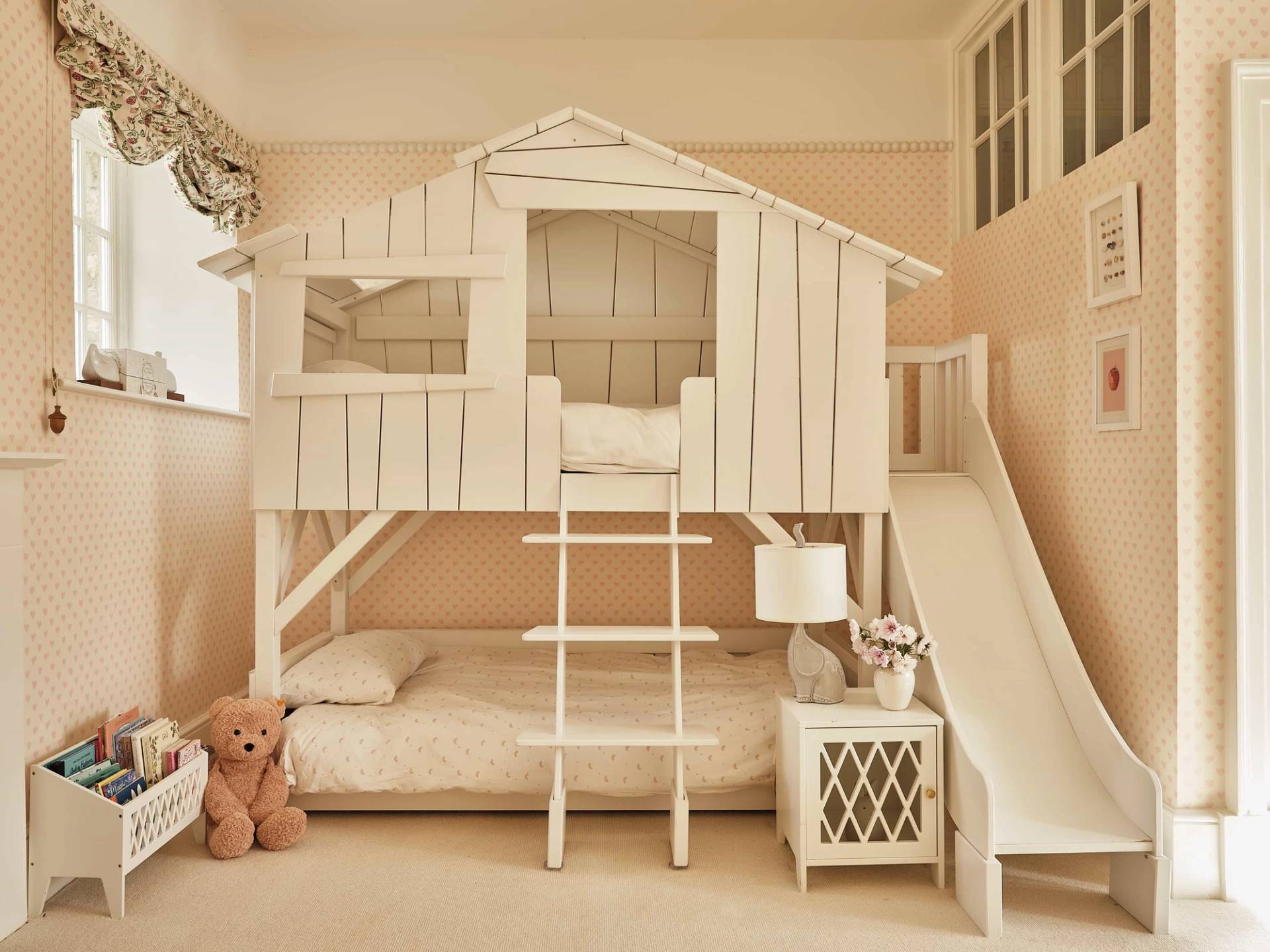 Bespoke wooden treehouse bunk bed with integrated slide in a luxury North Cotswolds location house, perfect for toy and apparel ads, Love Locations.