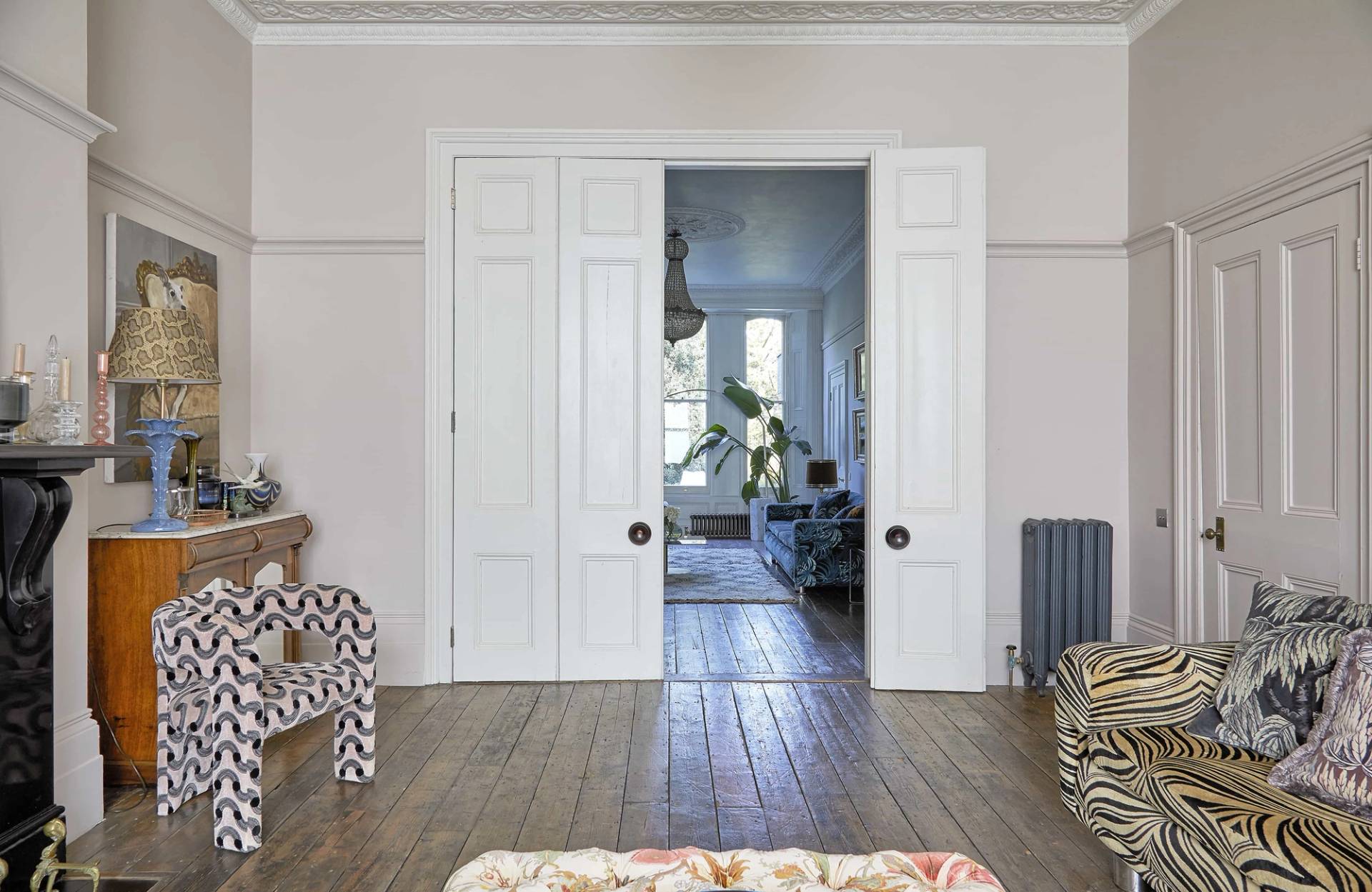 Grand white double door threshold connecting two reception rooms in a Victorian villa, Love Locations Finsbury Park.