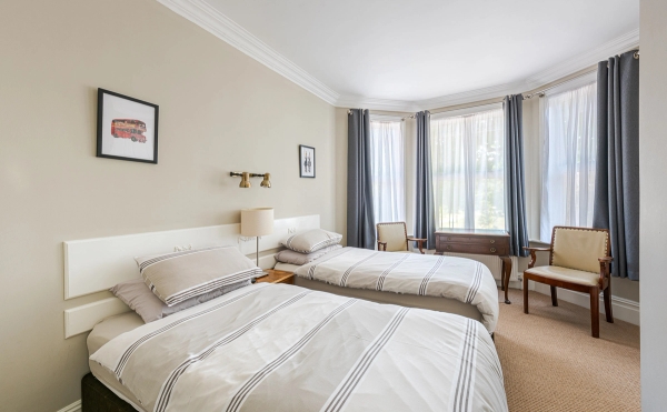 West London hotel building with layered interiors and historic character