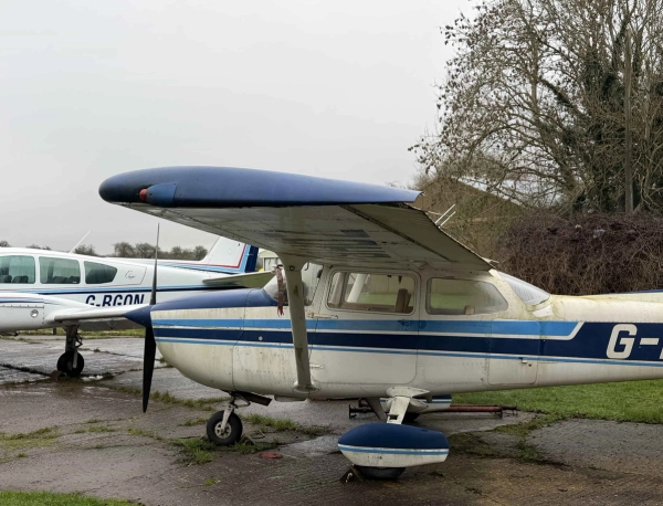 Close-up view of a vintage airplane nose and cockpit on a historic airfield shoot location in Corby, NN17, Love Locations.