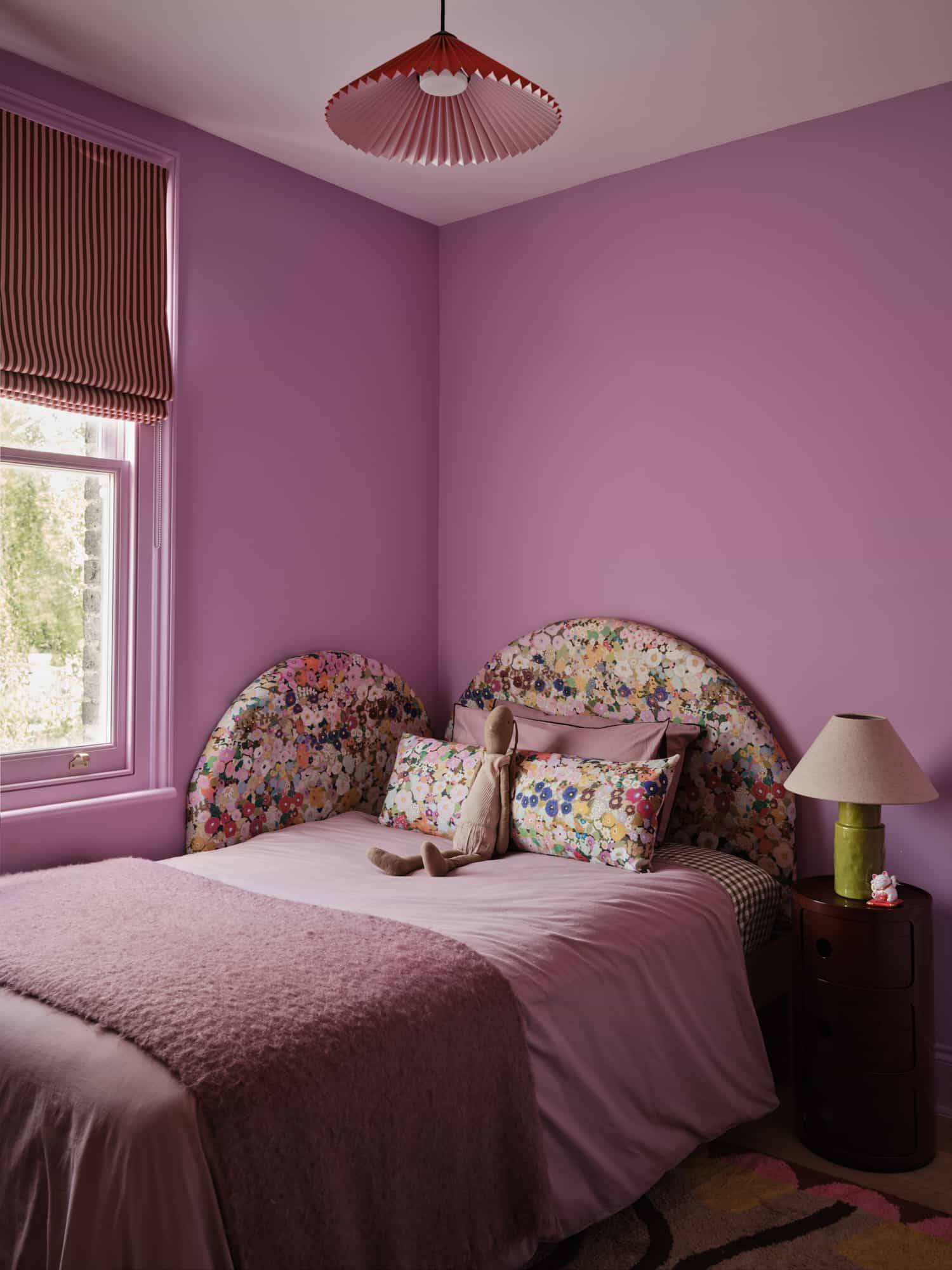 Love Locations creative kids room location SE23: Pastel lilac bedroom showing matching bedding layers and a curated bedside chest, ideal for editorial children's product photography.