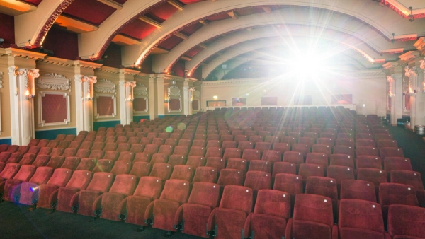 Elevated wide shot capturing the full scale of the historic theater auditorium seating at The Ritzy Screen 1 filming location by Love Locations.