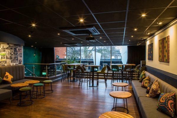 Elevated vantage point showing the versatile lounge and bar layout at Upstairs at the Ritzy in South London SW2, the ultimate shoot location for live performances and brand launches via Love Locations.