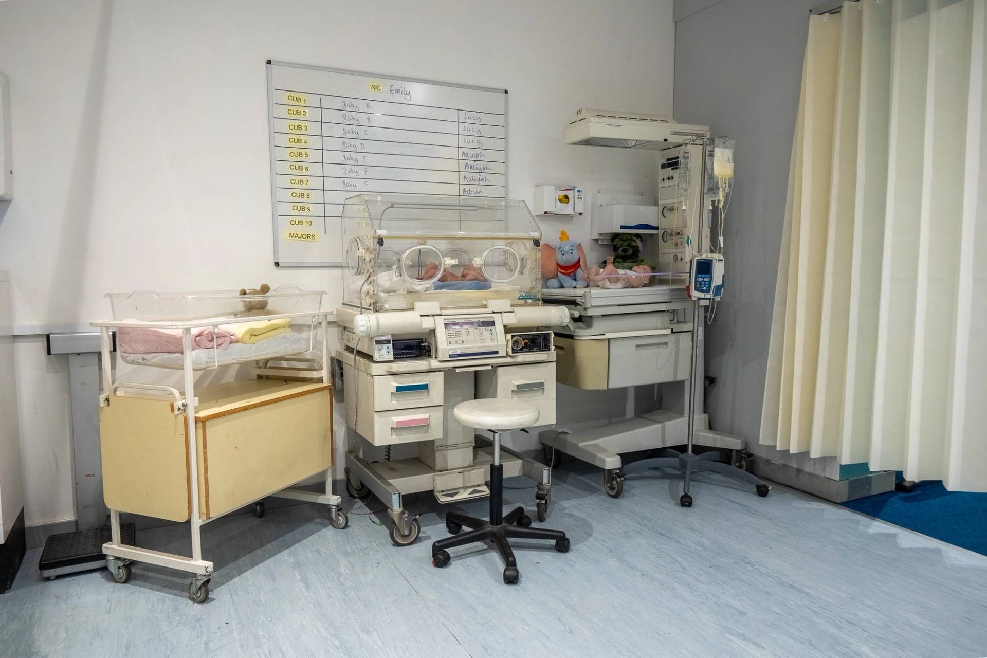 Neonatal intensive care unit (NICU) setting with baby incubator machine and medical monitors, Love Locations UB4.
