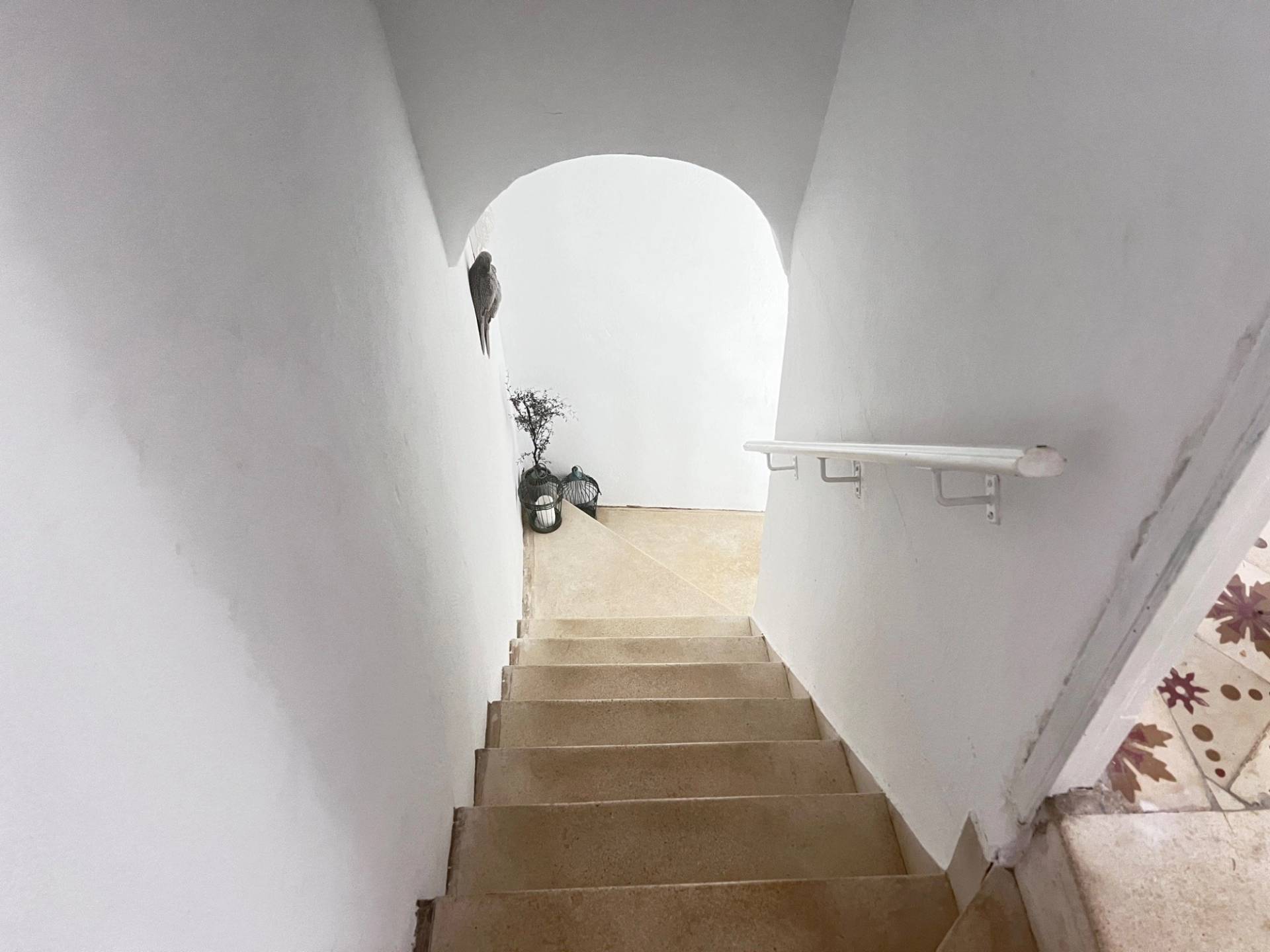 Traditional stone stairwell and archway corridor shoot location in Jimena de la Frontera by Love Locations, highlighting classic Spanish architectural features.