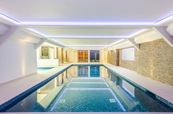 Steam room with tiled walls inside Essex barn, Love Locations