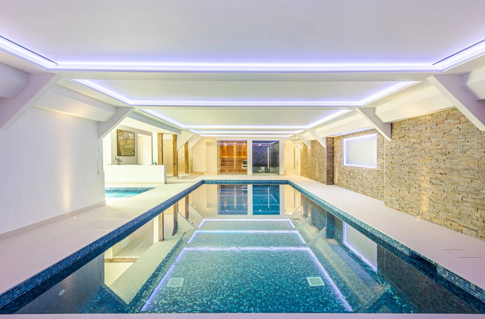 Steam room with tiled walls inside Essex barn, Love Locations