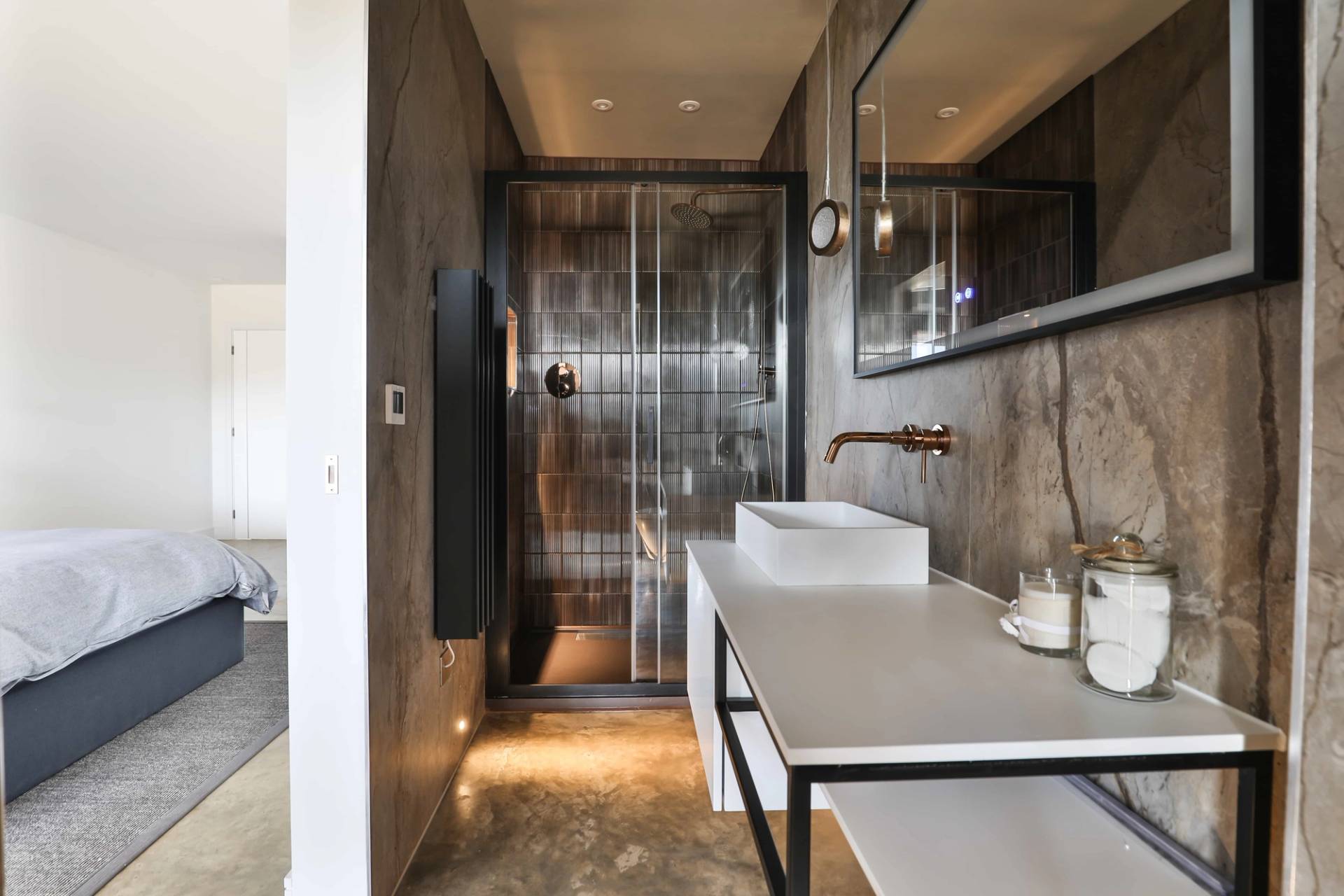 Walk-in ensuite shower room with marble wall finish, double vanity unit, and glass door, Love Locations CV23.