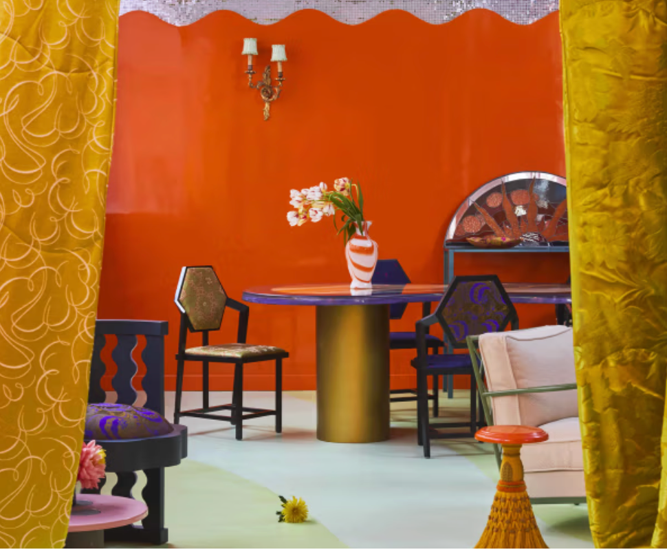 Vibrant Paris Apartment with glossy orange walls, sculptural furniture, colourful interiors and bold contemporary styling.