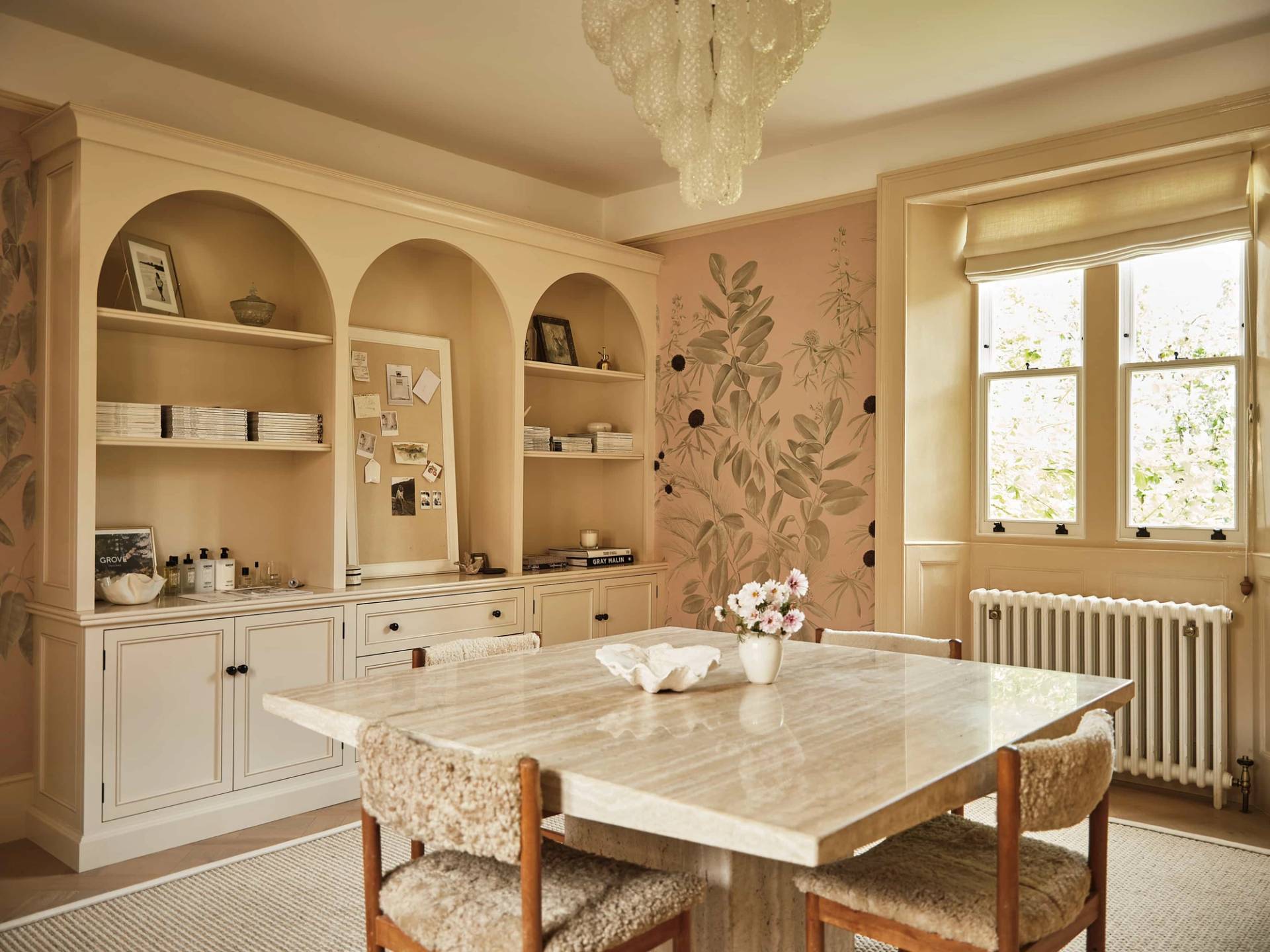 Dining room featuring bespoke arched wall display alcoves, floral wallpaper, and marble dining table, ideal for luxury tableware campaigns, Love Locations.