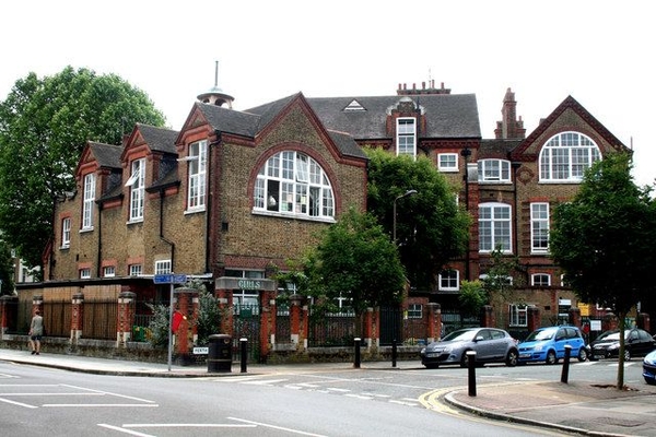 Stunning red brick Victorian school building architecture and entrance wing for commercial film location hire, exclusively on Love Locations.