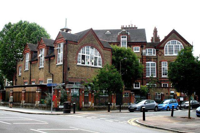 Stunning red brick Victorian school building architecture and entrance wing for commercial film location hire, exclusively on Love Locations.