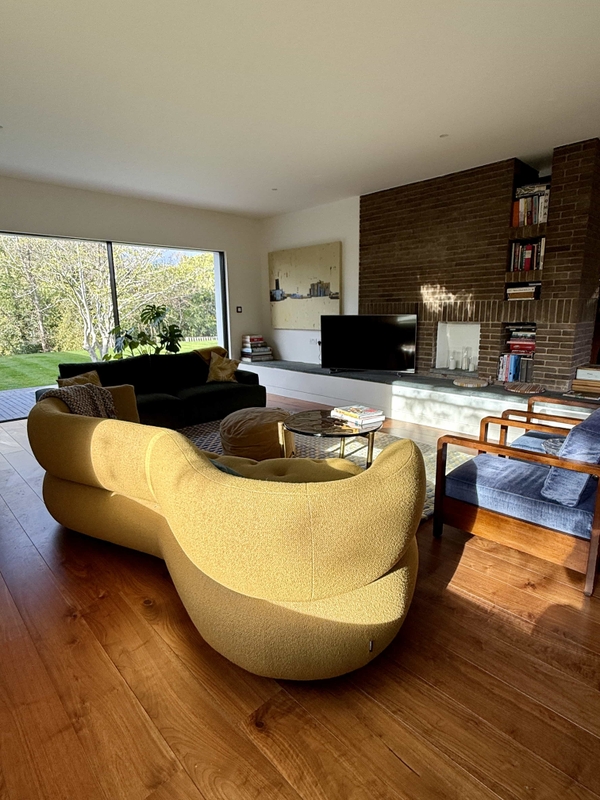 Bedroom with large windows and minimalist styling