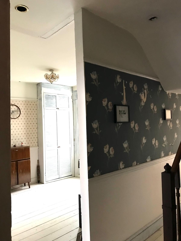 Quirky interior transition space revealing contrasting wallpaper styles and original architectural layouts in a suburban London home, Love Locations SE25.