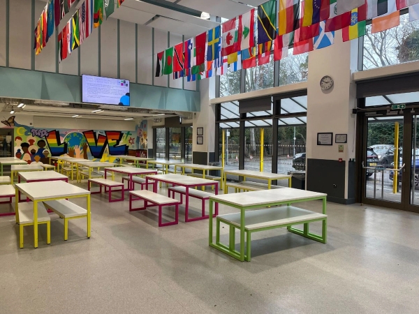 Love Locations educational facility location RG30: Spacious high-ceilinged school cafeteria and multi-use dining space, perfect for crowd scenes, background extras, and television productions.