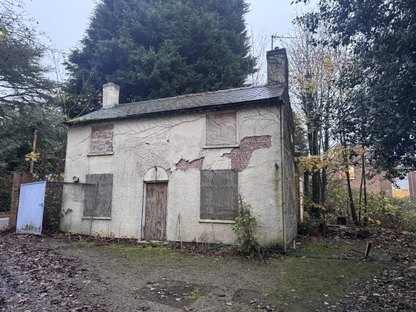 Boarded-up facade of an early Victorian cottage in Beeston, NG9, ideal for horror movies and historical drama filming, Love Locations.