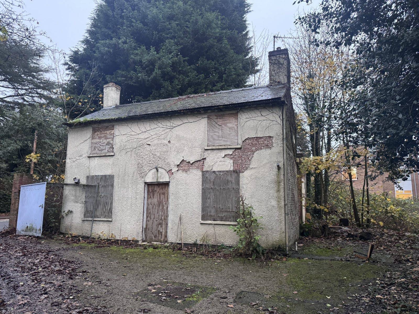 Boarded-up facade of an early Victorian cottage in Beeston, NG9, ideal for horror movies and historical drama filming, Love Locations.
