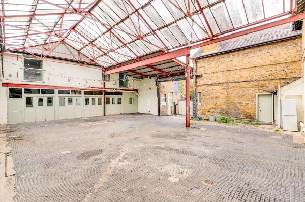 Spacious warehouse yard and industrial outdoor shoot space available for media hire in London through Love Locations.