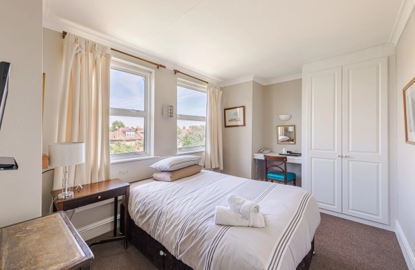 West London W6 hotel property with authentic worn textures and multiple rooms