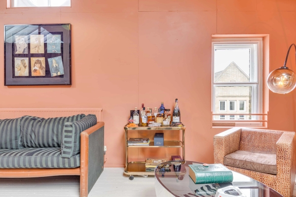 Vintage drinks trolley bar cart setup against terracotta pink walls for lifestyle brand photography, Love Locations.