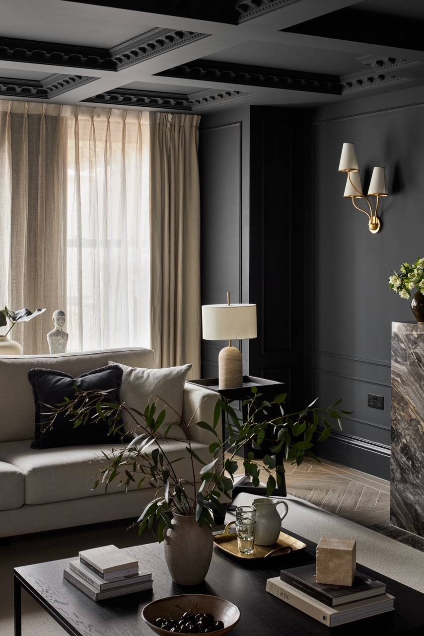 Luxury lounge seating vignette with a classic cream sofa, premium table lamps, and dark accent walls, suitable for sophisticated brand storytelling videos, Love Locations.