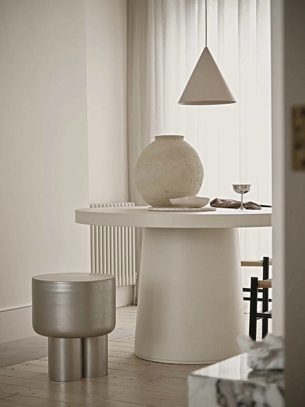 Modern East London interior with pale timber floors and neutral tones
