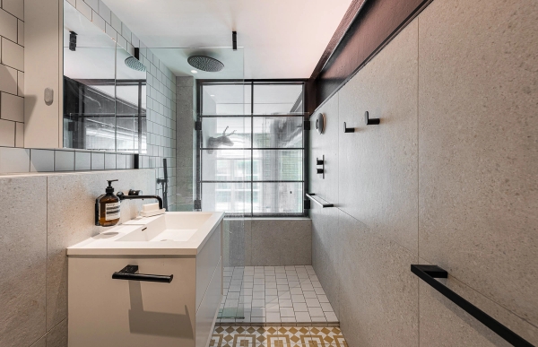 Contemporary residential bathroom location featuring premium modern fixtures and industrial accents, Love Locations SE1.