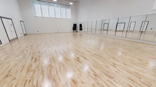 Professional school dance studio location space with full-length mirrored walls and ballet barres, bookable through Love Locations.