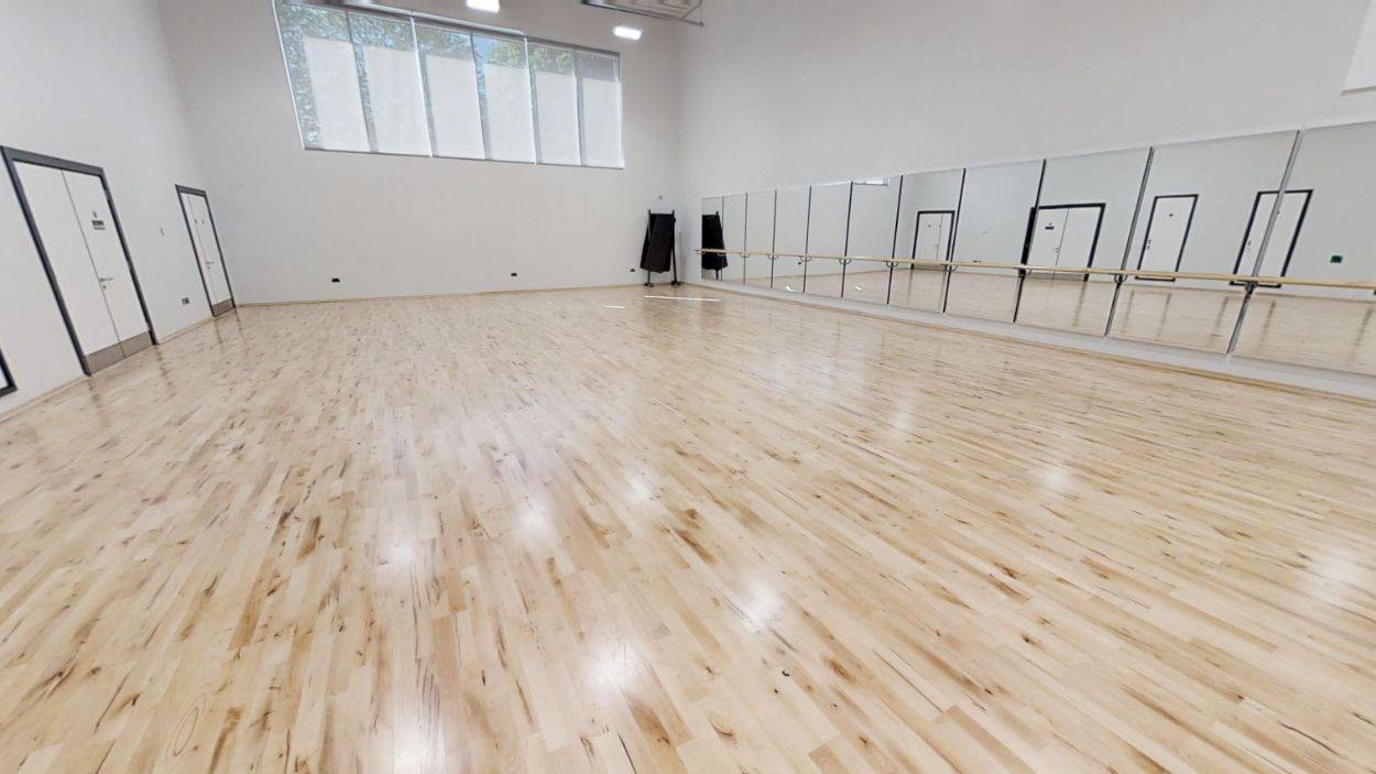 Professional school dance studio location space with full-length mirrored walls and ballet barres, bookable through Love Locations.