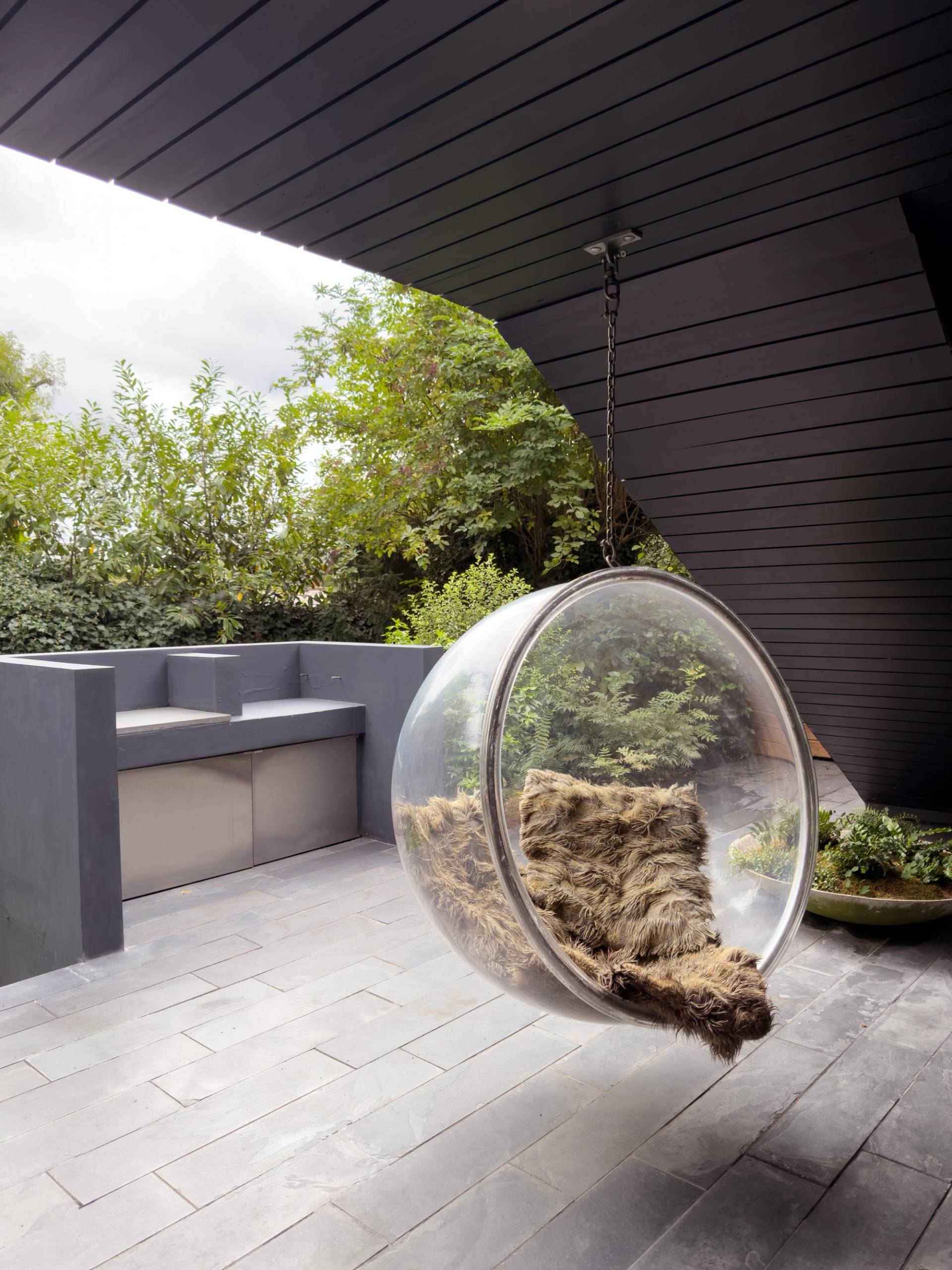 Spacious back garden at Highgate Zen Love Locations home perfect for outdoor activities.