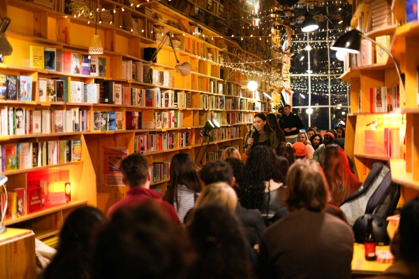 Stylish Whitechapel bookshop with colourful shelving and social seating space in E1 – love locations
