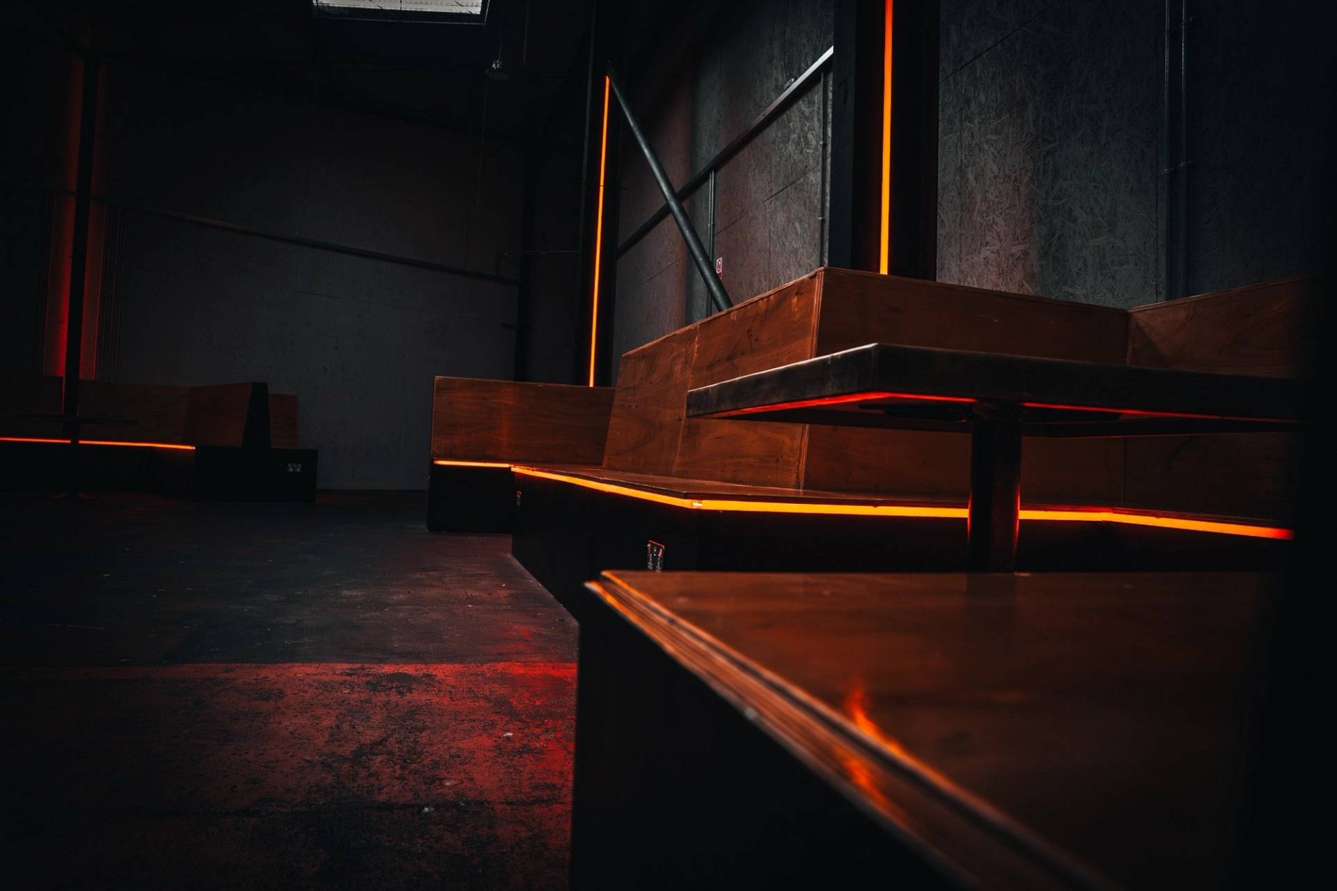 Multi-tiered timber platform seating and staging area for event production in Manchester M3 via Love Locations.