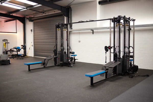Dual pulley cable station and functional training rig configuration, ideal for fitness tutorial and commercial exercise filming, Love Locations.