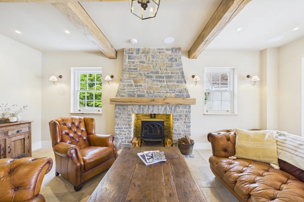 Love Locations rustic living room with stone fireplace for filming