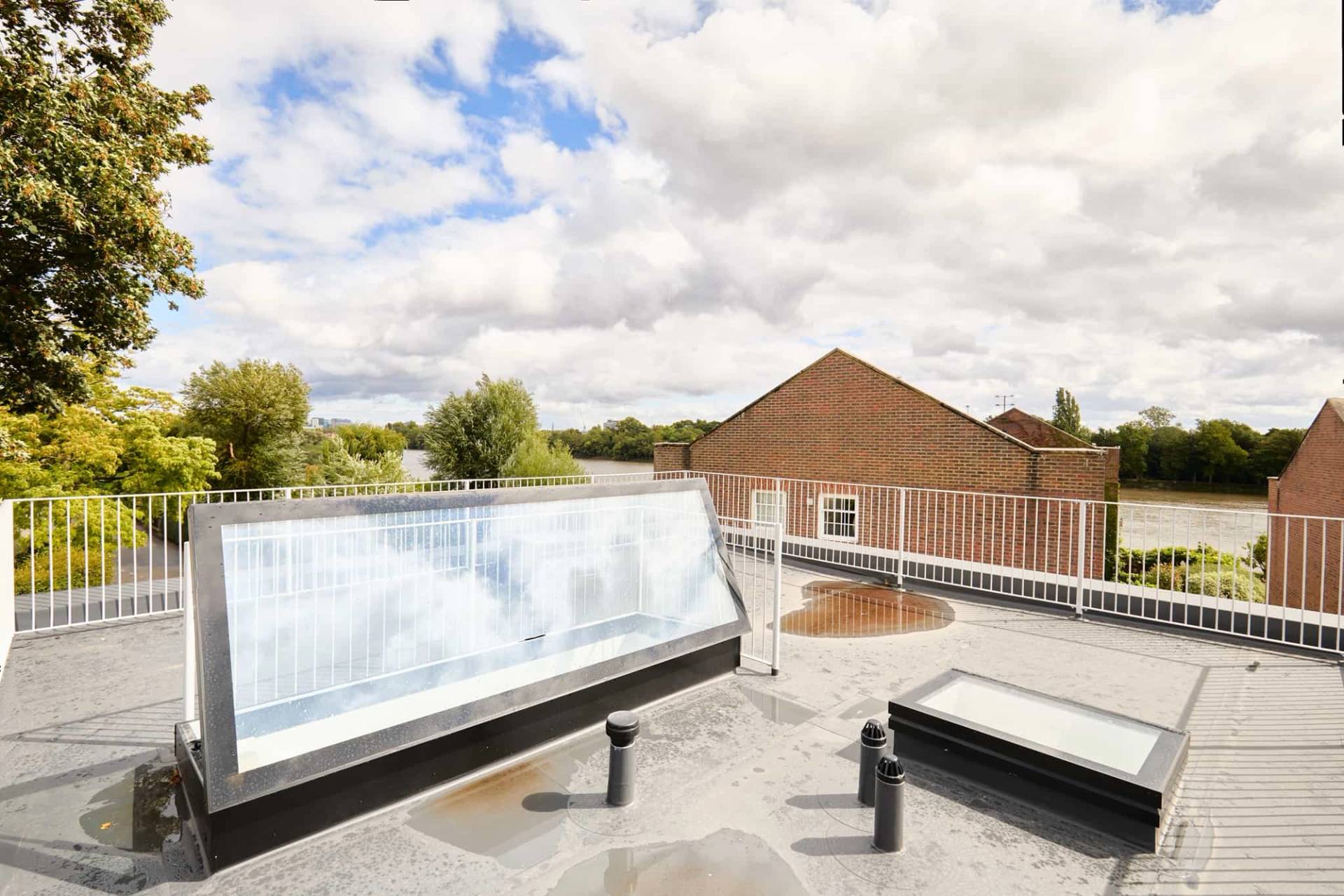 Rooftop seating area overlooking river in W4, Love Locations