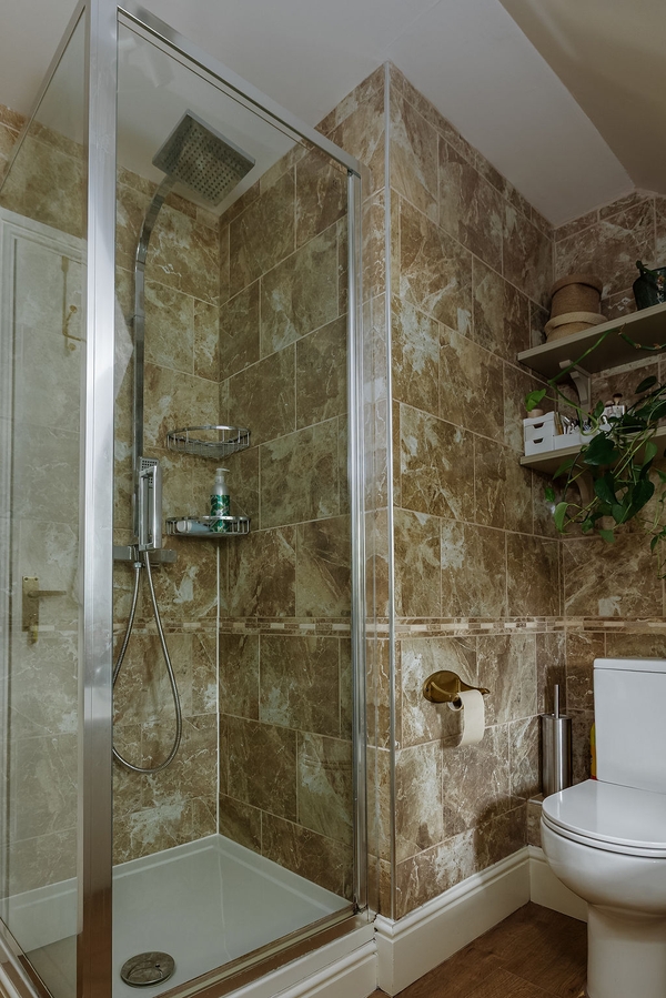 Freestanding bath beneath vaulted ceiling at Love Locations filming location in Liss, Hampshire GU33.