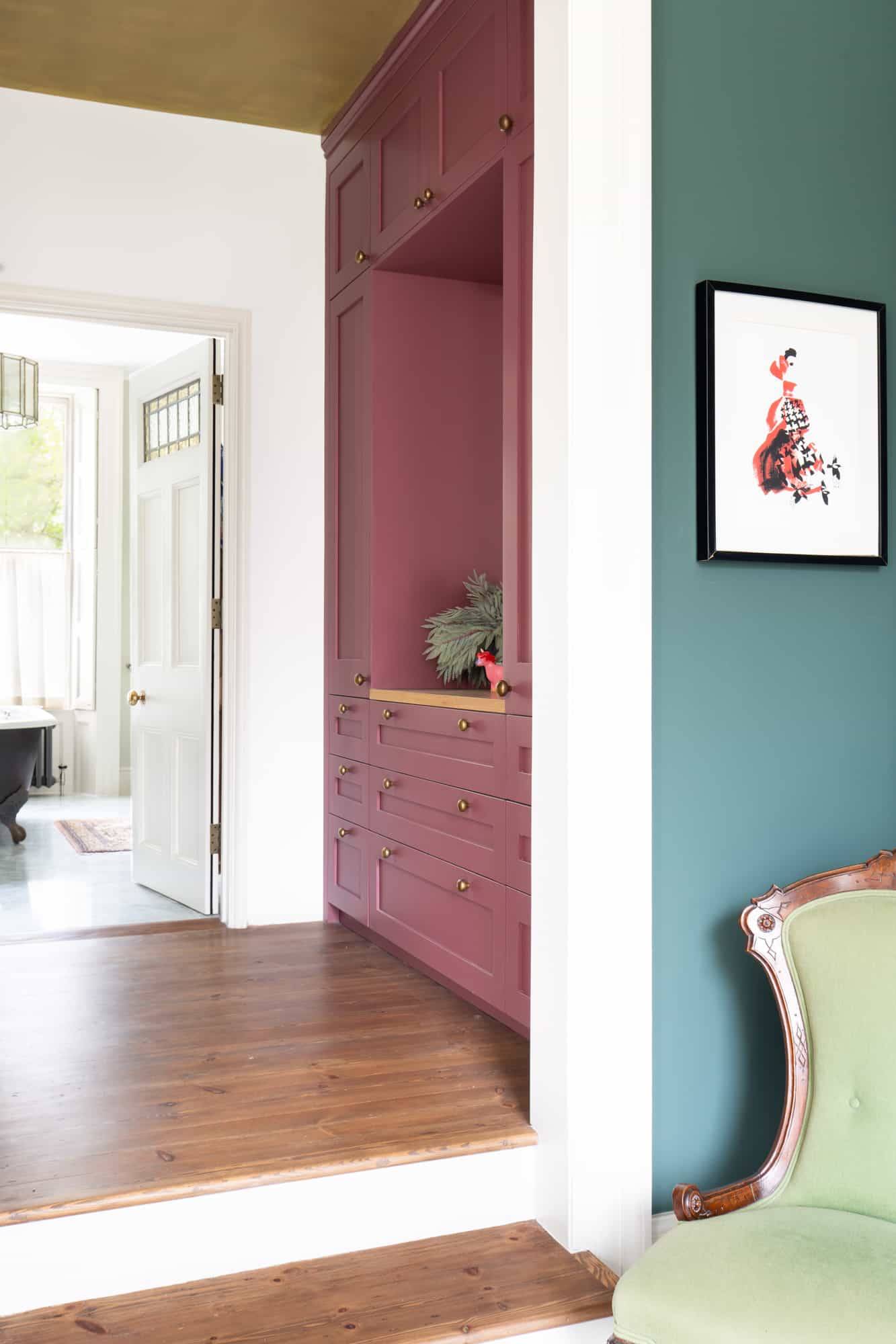 Split image detail showing dark pink custom wardrobes, green armchair, and period doors in SE5 via Love Locations.