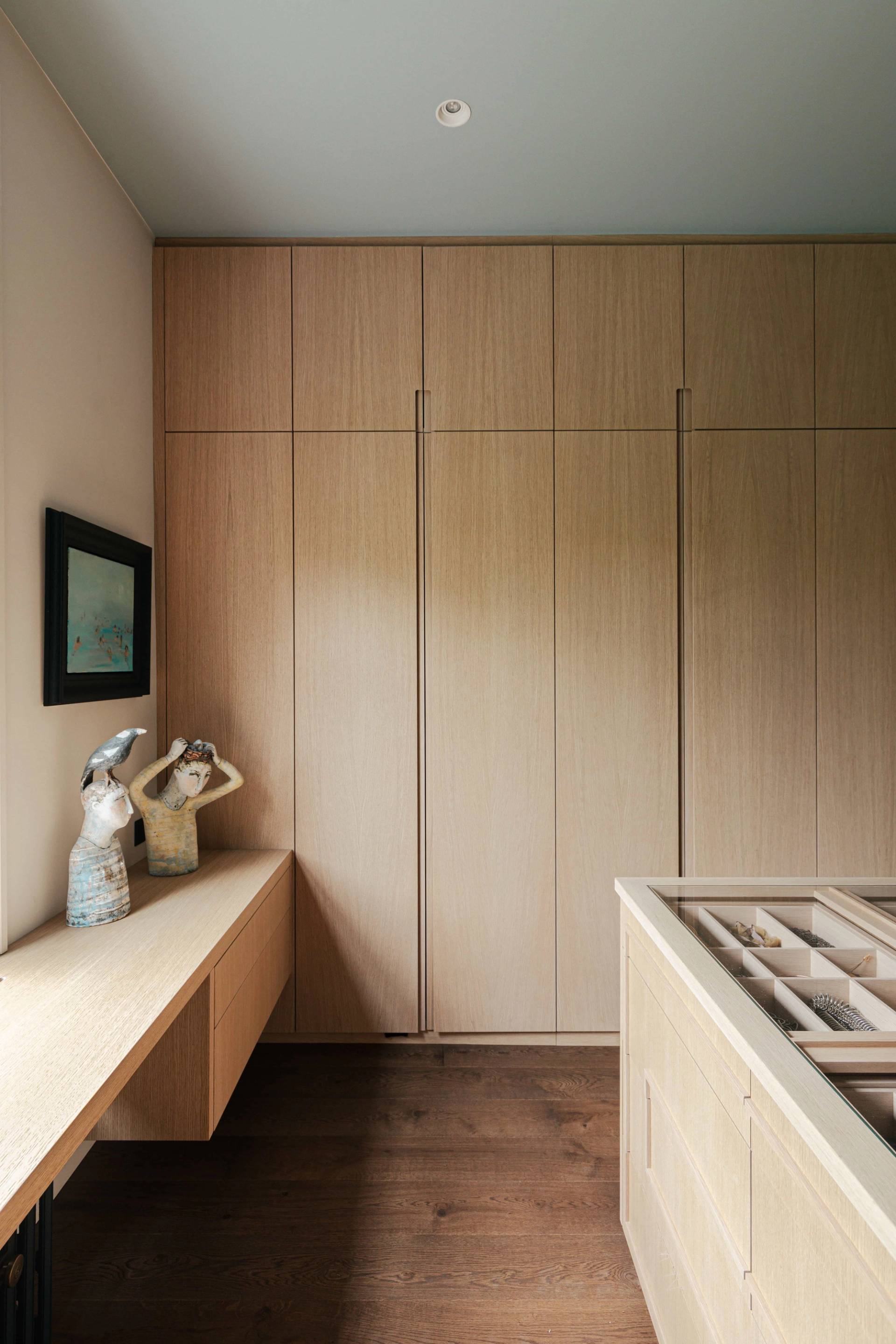 Full-height oak dressing room wardrobes in a luxury Barnes location house, Love Locations.