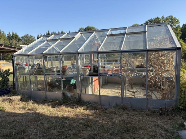 Large commercial greenhouse glasshouse structure set on rural farmland in Lewes, Love Locations BN8.