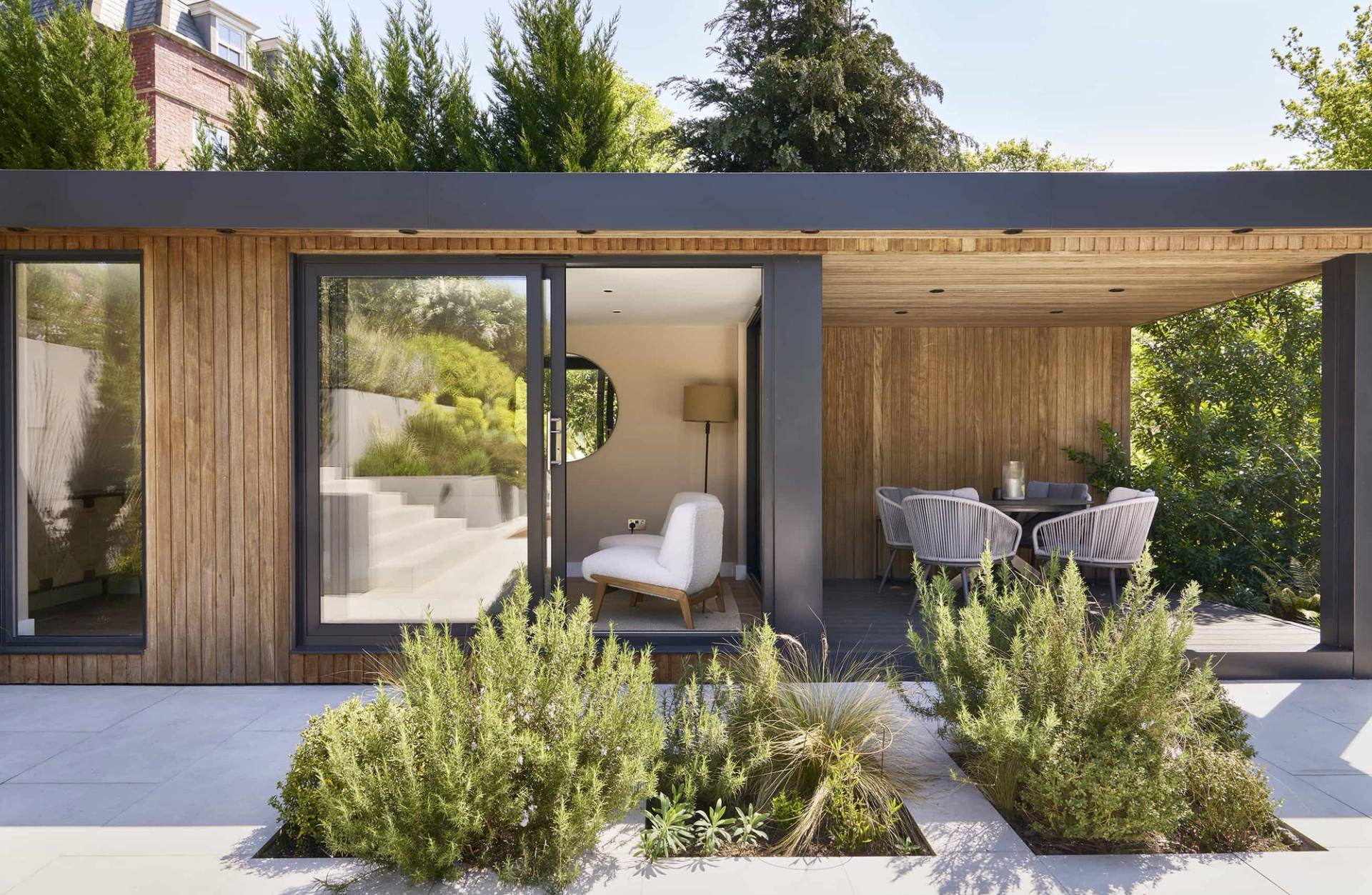 Modern timber-clad garden pavilion and outdoor entertaining patio for lifestyle brand filming, Love Locations.